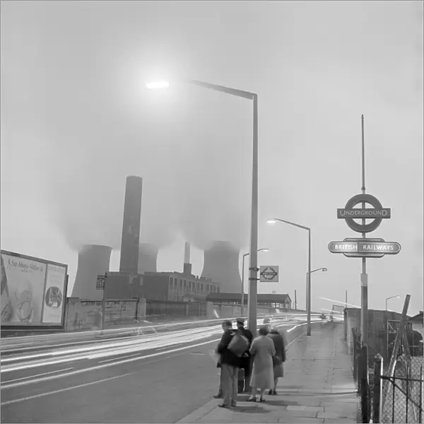 Bus stop queue and power station a071671