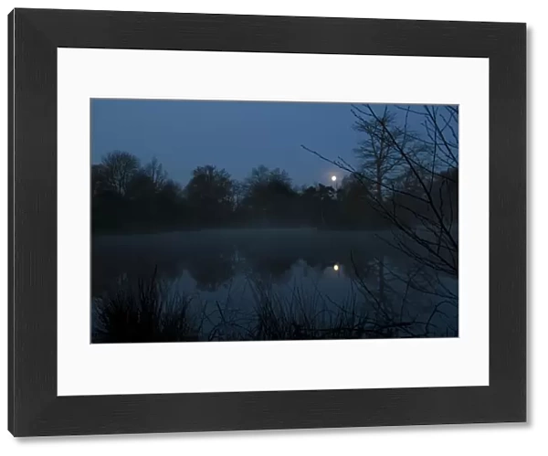 Moonrise over a lake DP041660