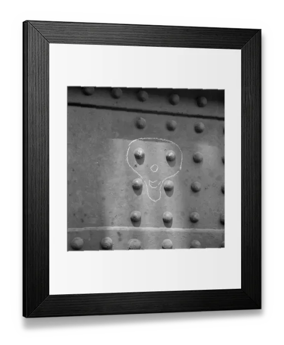 Framed Print : Face drawn in chalk around metal rivets, London Docks a064944