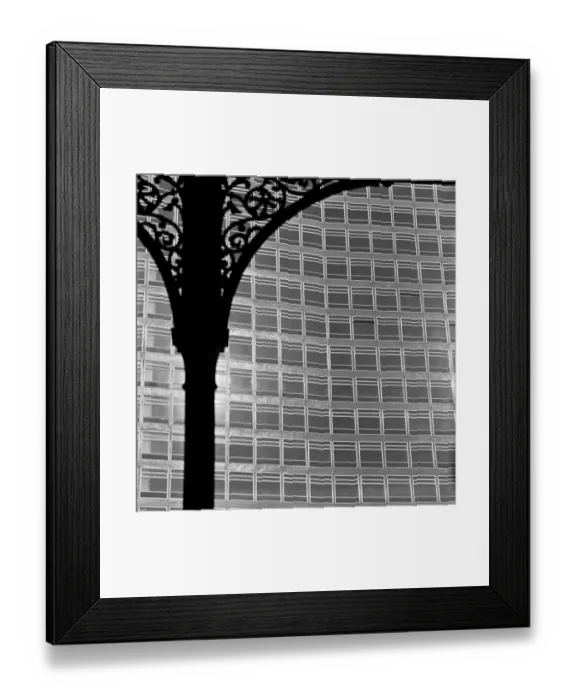 Framed Print : Iron spandrel with office block beyond a062695