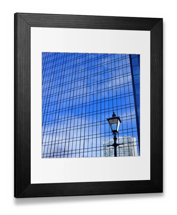 Framed Print : Blue sky reflected in glass tower block DP069226
