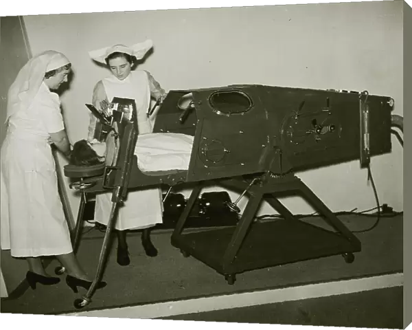 Demonstrating an iron lung med01_01_0377