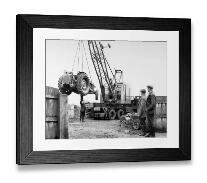 Framed Print : Unloading a tractor JLP01_01_073_41