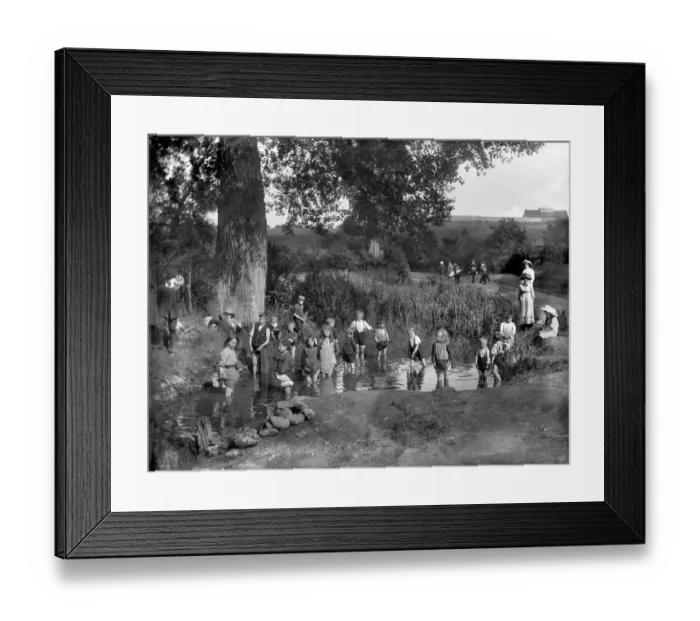 Framed Print : Children playing in a pond in 1914 CC71_00076