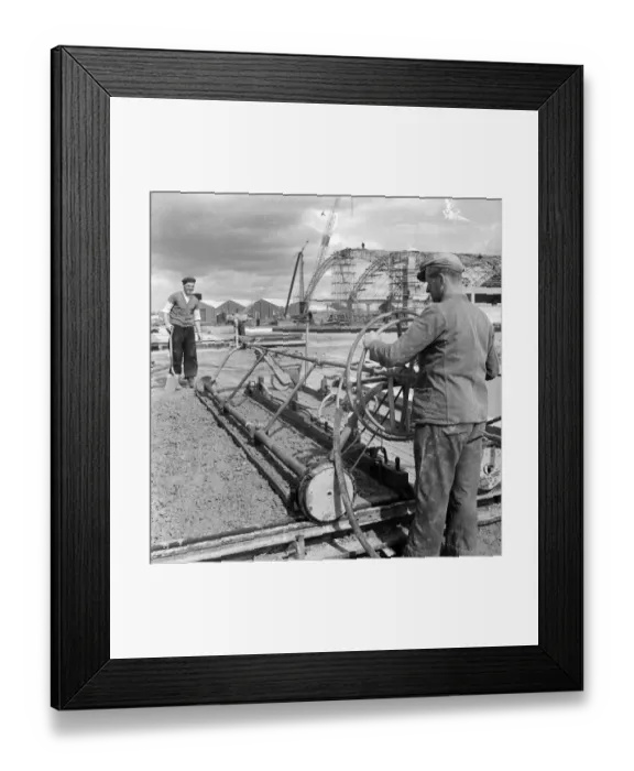 Framed Print : Compacting the runway JLP01_08_022162a Framed Print : Compacting the runway JLP01_08_022162a
