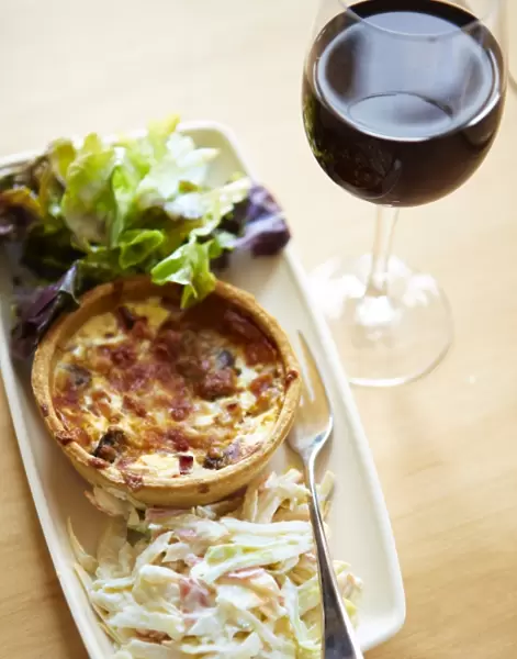 Quiche with a glass of wine N100327