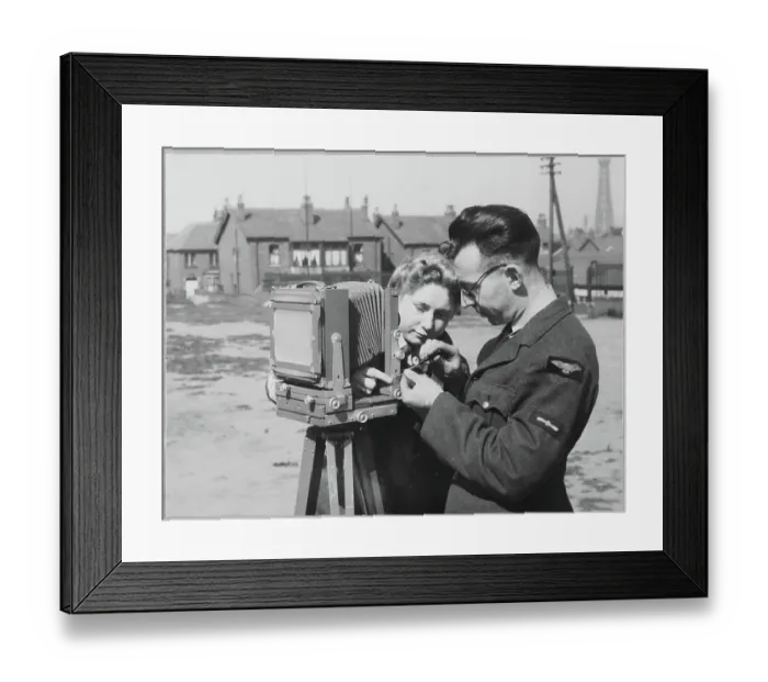 Framed Print : An RAF instructor making repairs to a camera chp01_07_01_044