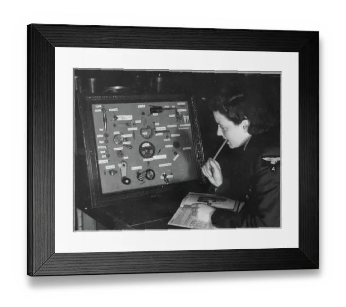 Framed Print : A Women's Auxiliary Air Force (WAAF) trainee revising the components of a camera gear box chp01_07_01_050