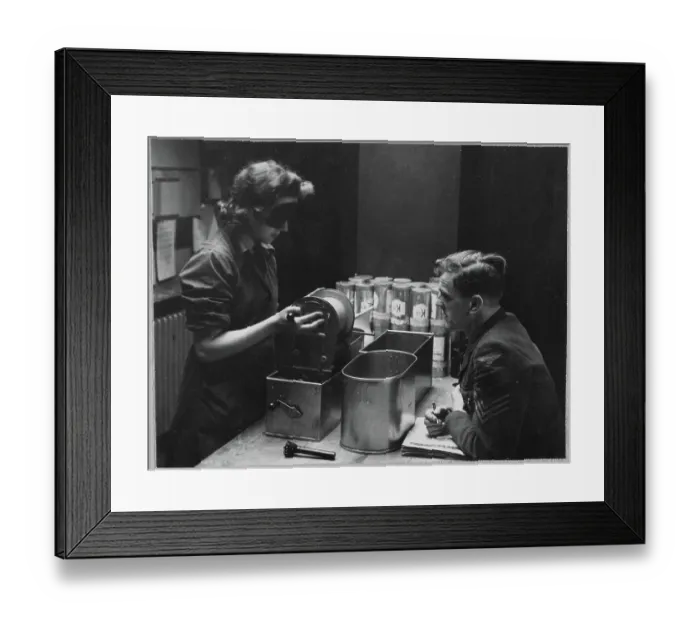 Framed Print : A Women's Auxiliary Air Force (WAAF) trainee handling a roll of photographic film chp01_07_01_059 Framed Print : A Women's Auxiliary Air Force (WAAF) trainee handling a roll of photographic film chp01_07_01_059