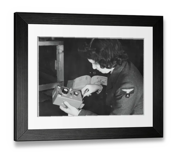 Framed Print : Women's Auxiliary Air Force (WAAF) trainee inspecting a T35 controller during training chp01_07_01_069