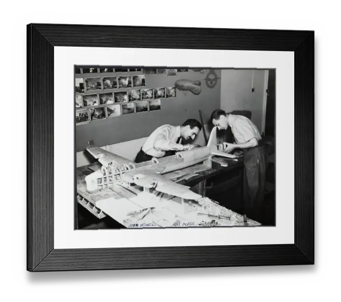 Framed Print : RAF aviators John Howell and Ray Morse working on a model of a Stirling aircraft chp01_07_01_131