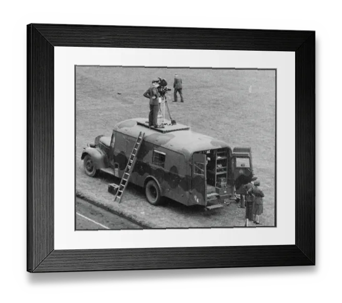 Framed Print : RAF personnel filming from the roof of a military truck chp01_07_01_166
