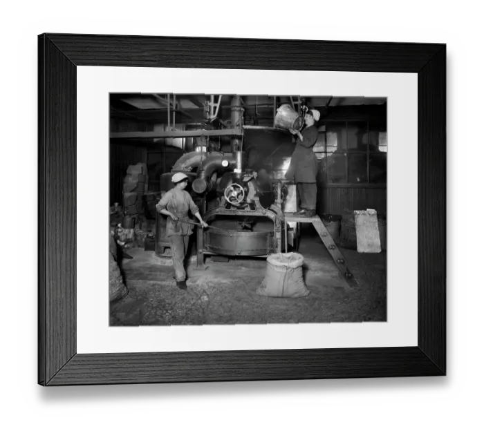 Framed Print : Two women filling Sirocco roaster with coffee beans BL24300_001 Framed Print : Two women filling Sirocco roaster with coffee beans BL24300_001