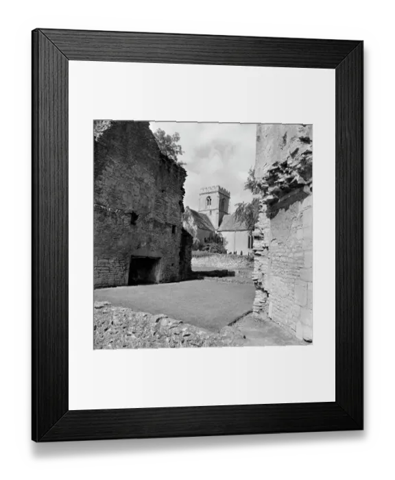 Framed Print : Minster Lovell Hall and St Kenelms Church a081394