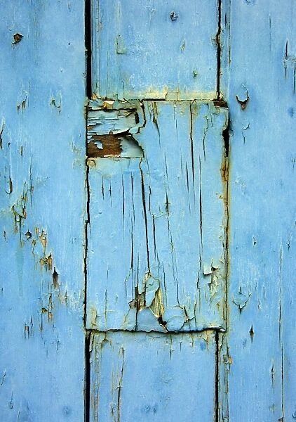 Blue door DP026613. Detailed view of peeling blue paint on door
