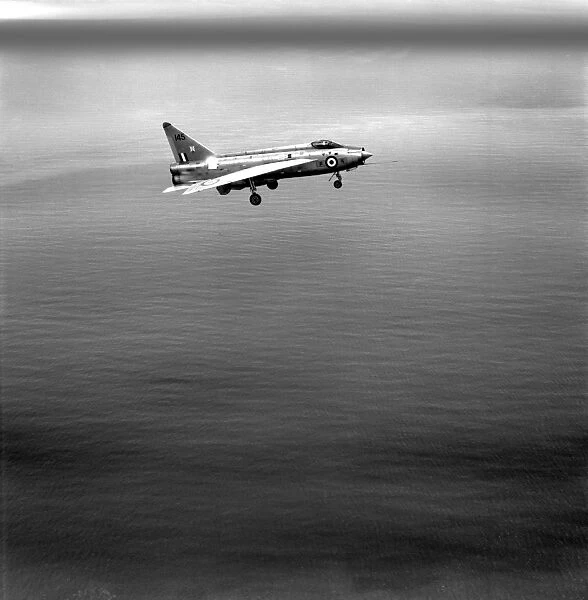 Lightning EAW187844. RAF English Electric Lightning F1 flying over the sea in 1968