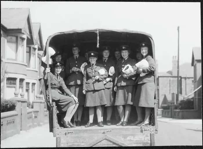 Framed Print : Members of the WAAF posed for the camera on the back of a military truck chp01_07_01_100