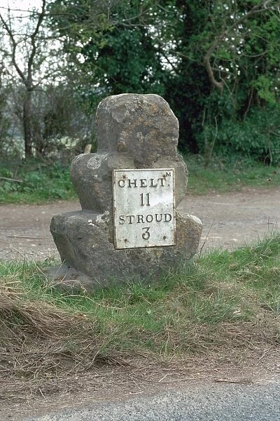 Milestone. An unusual triple-stepped stone pillar. IoE 133201