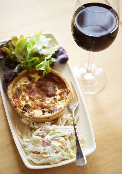 Quiche with a glass of wine N100327