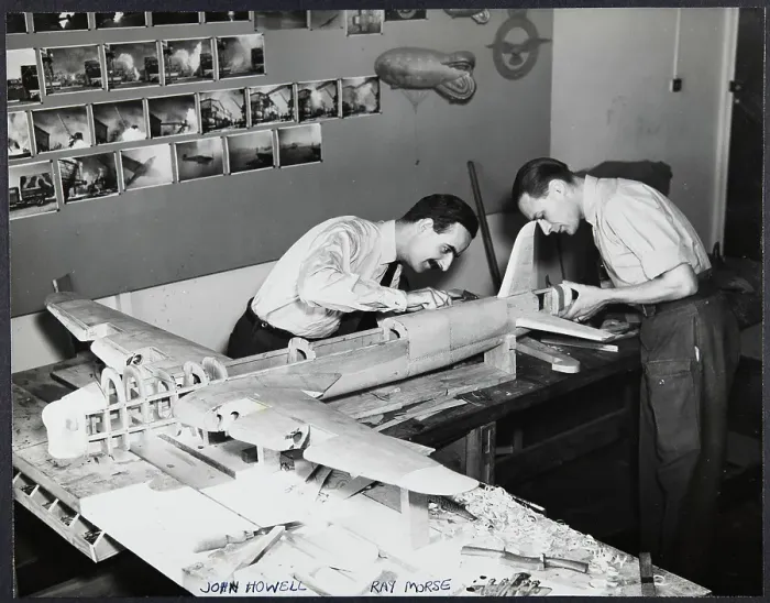 Framed Print : RAF aviators John Howell and Ray Morse working on a model of a Stirling aircraft chp01_07_01_131