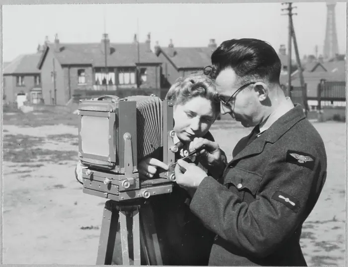Framed Print : An RAF instructor making repairs to a camera chp01_07_01_044
