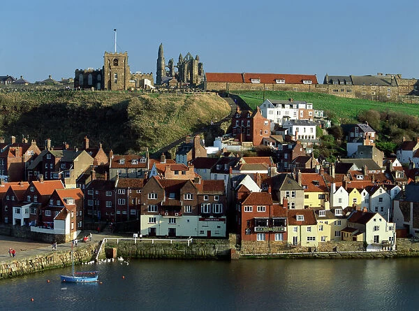 Whitby K011127. WHITBY, North Yorkshire. View looking across the harbour to Old Town