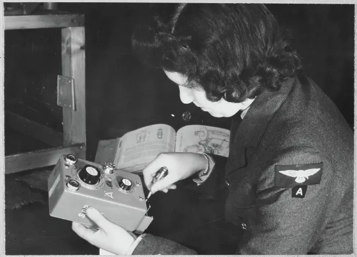 Framed Print : Women's Auxiliary Air Force (WAAF) trainee inspecting a T35 controller during training chp01_07_01_069
