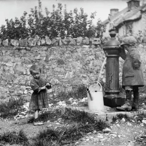 Print of two children at a water pump in Cheddar, Somerset