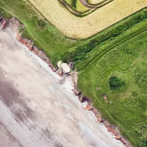 Print of a Second World War lozenge pillbox at risk from coastal erosion Print of a Second World War lozenge pillbox at risk from coastal erosion