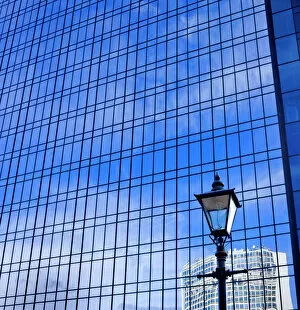 Lamp Post Collection: Blue sky reflected in glass tower block DP069226