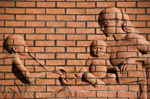 Orange Collection: Brick relief of mother and children DP035286