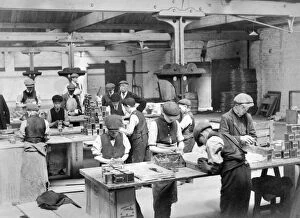 Images Dated 23rd July 2009: Children labelling tins of tea c. 1910, Butlers Wharf BB87_09690