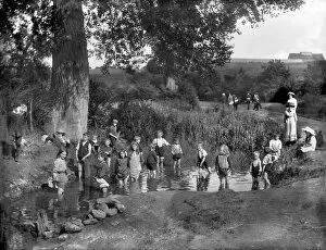 Images Dated 30th July 2009: Children playing in a pond in 1914 CC71_00076