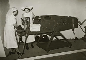 Women Collection: Demonstrating an iron lung med01_01_0377