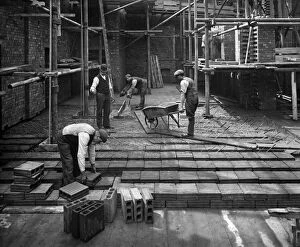 City of London Collection: Laying a hollow pot floor, Lloyds Avenue, London BL19950A
