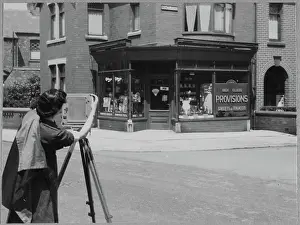 Second World War Prints: Member of the Women's Auxiliary Air Force (WAAF) practising exterior building photography chp01_07_01_039