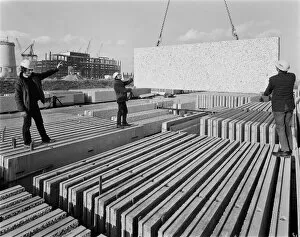 Workmen Collection: Moving concrete slabs JLP01_08_096704