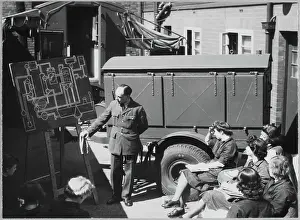 Second World War Prints: RAF instructor directing trainees in the use of the mobile photographic darkroom chp01_07_01_073