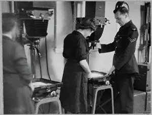 Second World War Prints: RAF instructor directing a WAAF trainee in the use of photographic enlargers chp01_07_01_065
