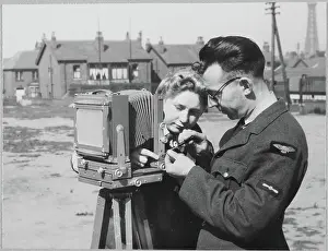 An RAF instructor making repairs to a camera chp01_07_01_044