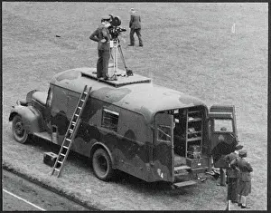 Second World War Prints: RAF personnel filming from the roof of a military truck chp01_07_01_166