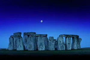 Henge Collection: Stonehenge at dusk with moon N110366