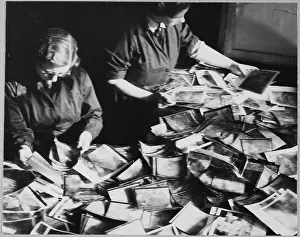 WAAF trainees sorting through piles of aerial photographic prints during training chp01_07_01_066