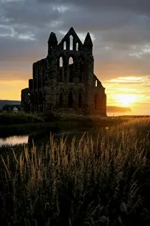 Sunrise and sunset Collection: Whitby Abbey at sunset N080799