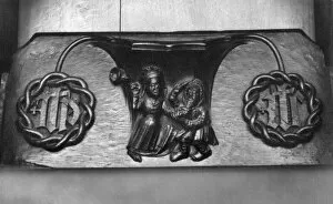 Misericords Collection: Woman beating husband OP04453