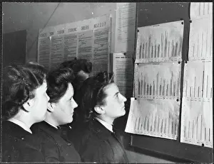 Second World War Prints: Women's Auxiliary Air Force trainees examining progress charts chp01_07_01_108