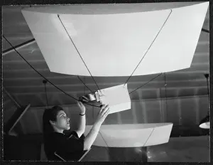 Second World War Prints: A Women's Auxiliary Air Force (WAAF) trainee preparing safelights prior to printing chp01_07_01_062